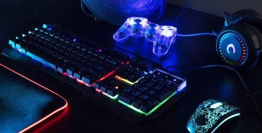 view-illuminated-neon-gaming-keyboard-setup-controller